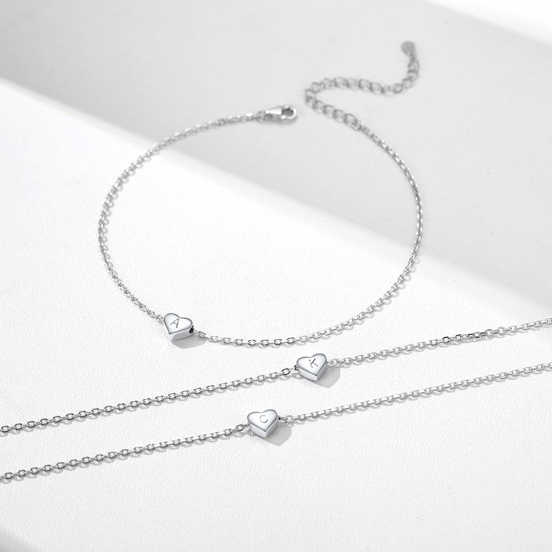 Silver bracelet with heart-shaped charms