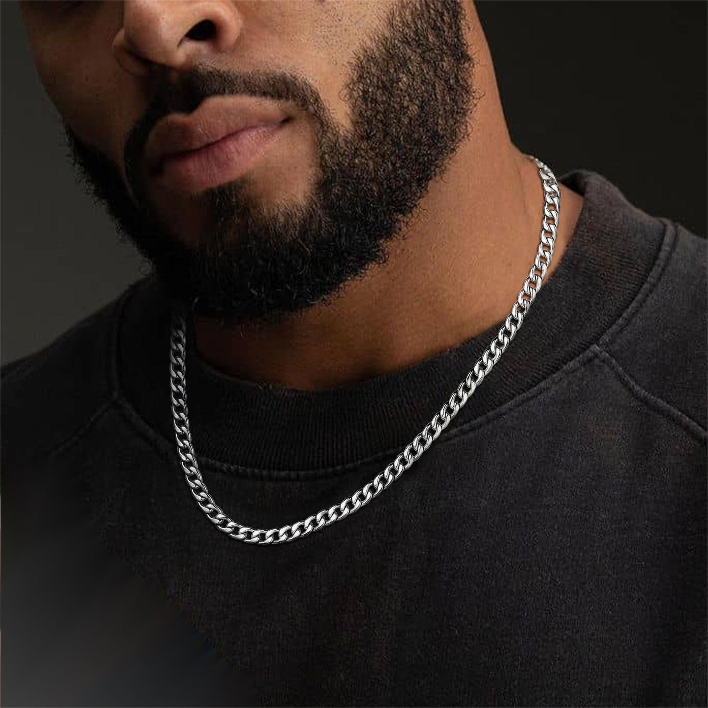 Man wearing a stainless steel Cuban link chain necklace