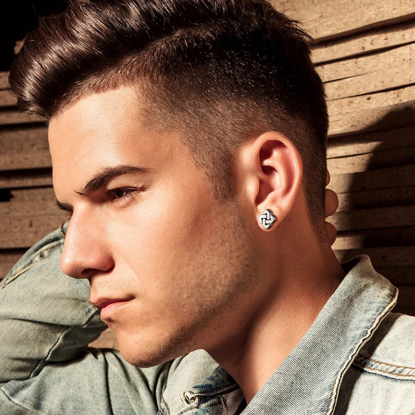 Man wearing Celtic knot stud earring, stainless steel jewelry