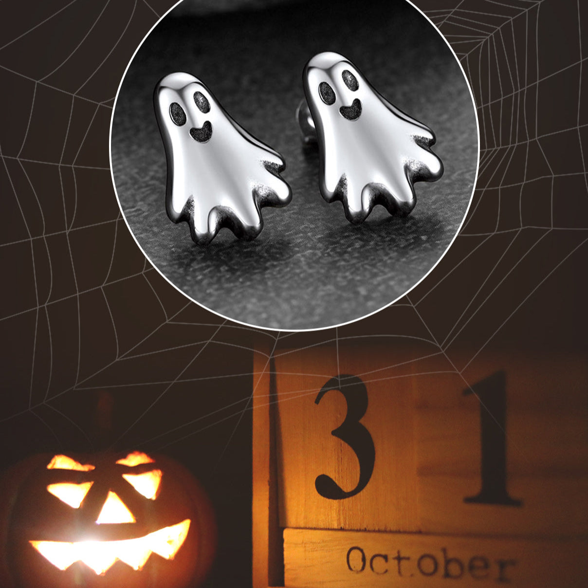 Ghost-shaped earrings on a spiderweb background with a pumpkin and '31 October' sign.