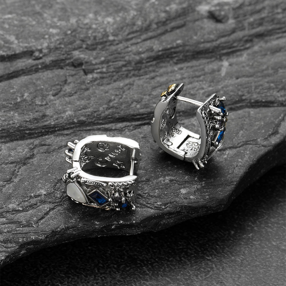 Detailed silver graffiti joker earrings with gold flower accent and multicolor stones