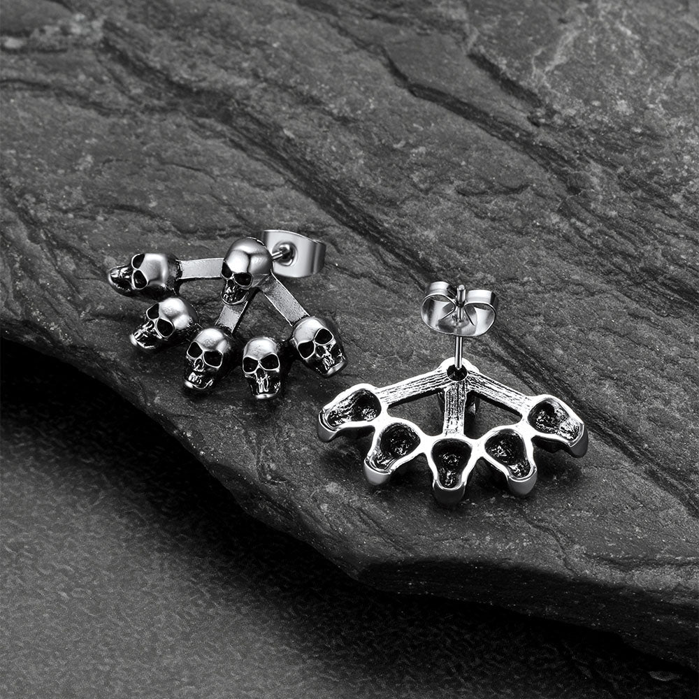Gothic multiple skull stud earrings photographed