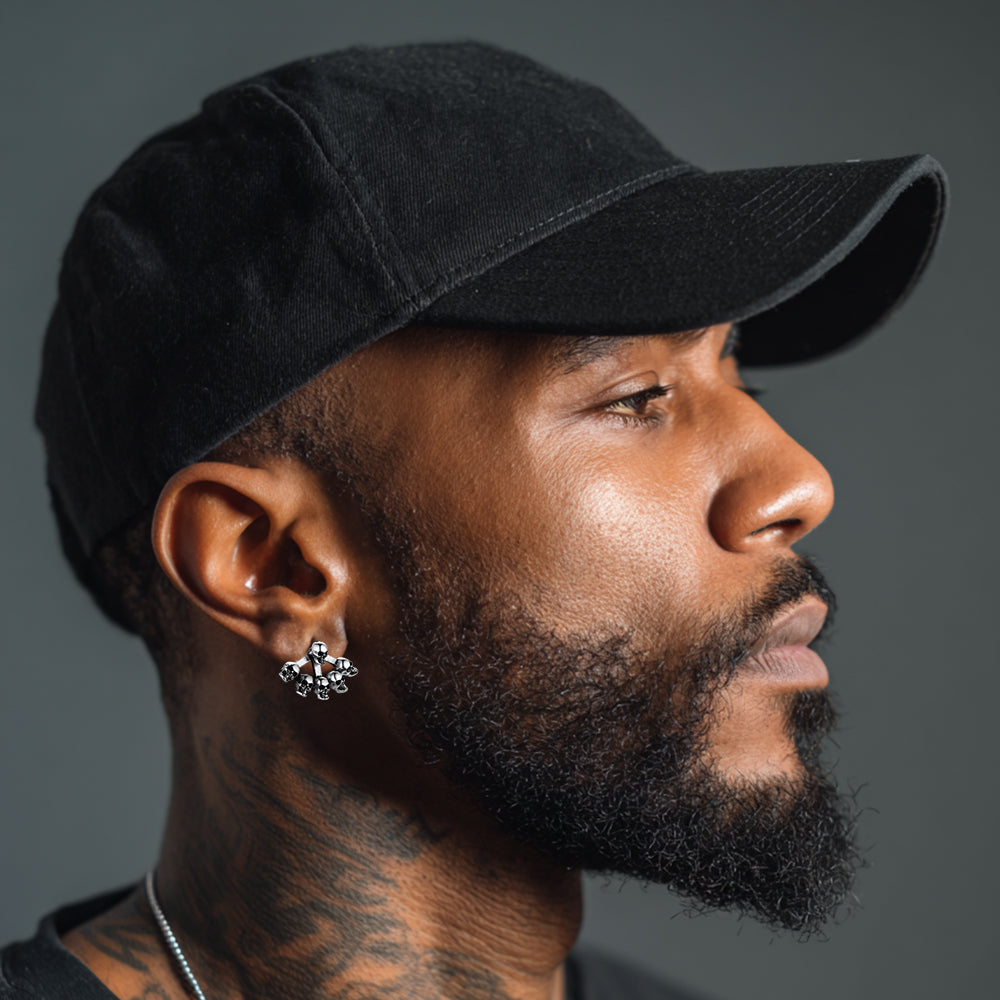 Man wearing a Multiple Skeleton Skull Head Stud Earring