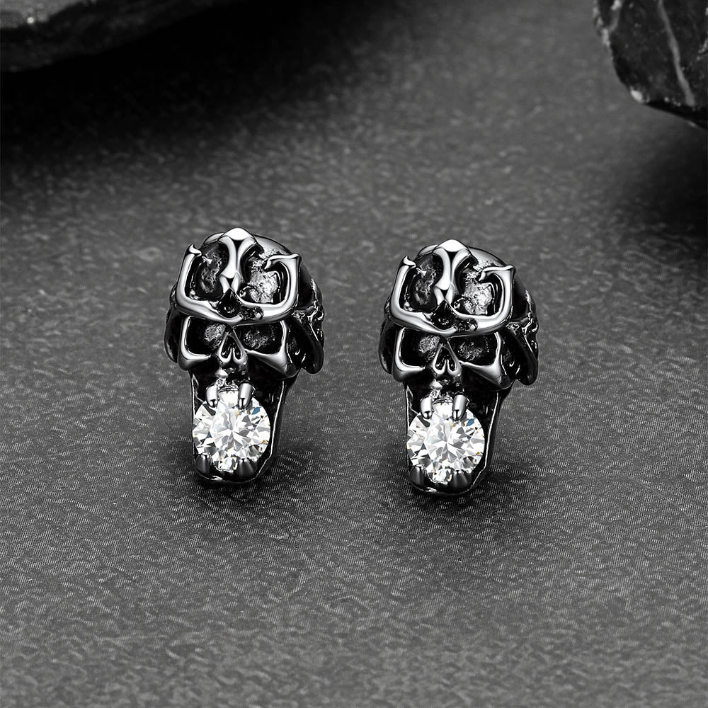 Pair of punk skull earrings crafted in stainless steel.
