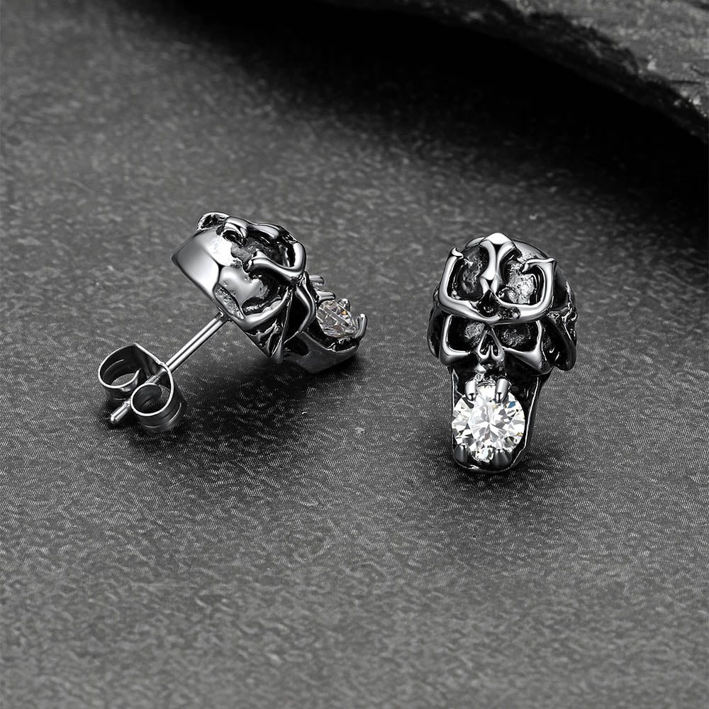 Pair of punk skull earrings crafted in stainless steel.