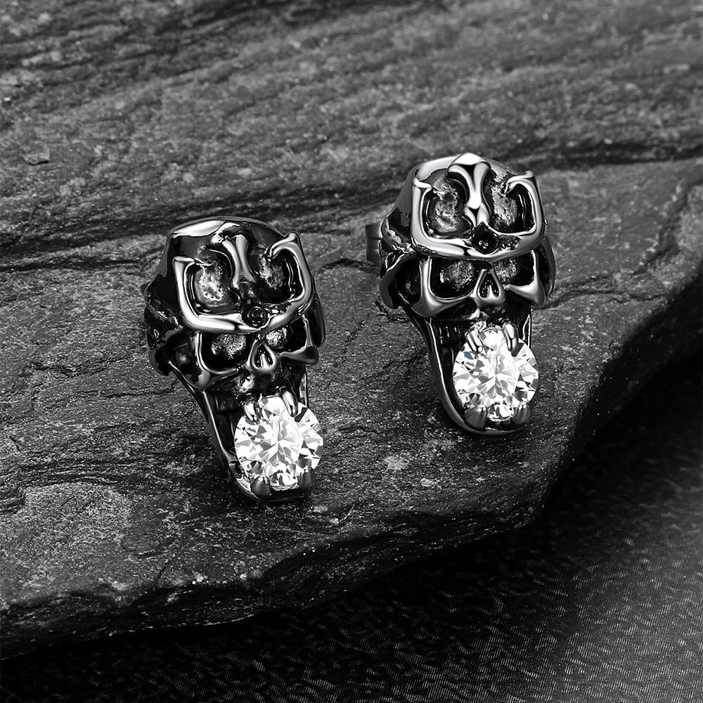 Skull stud earrings for men paired with gothic fashion.