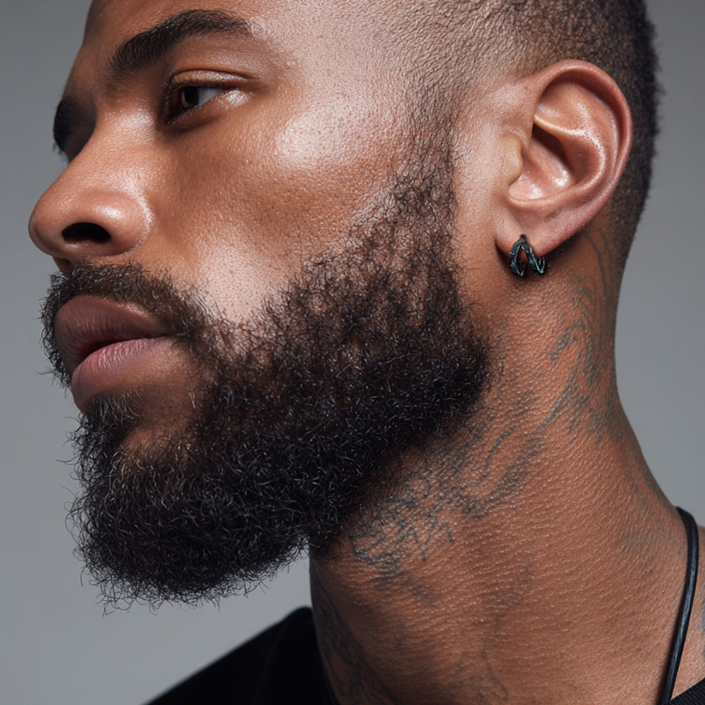 Close-up of a man with Hoop Huggie Earrings
