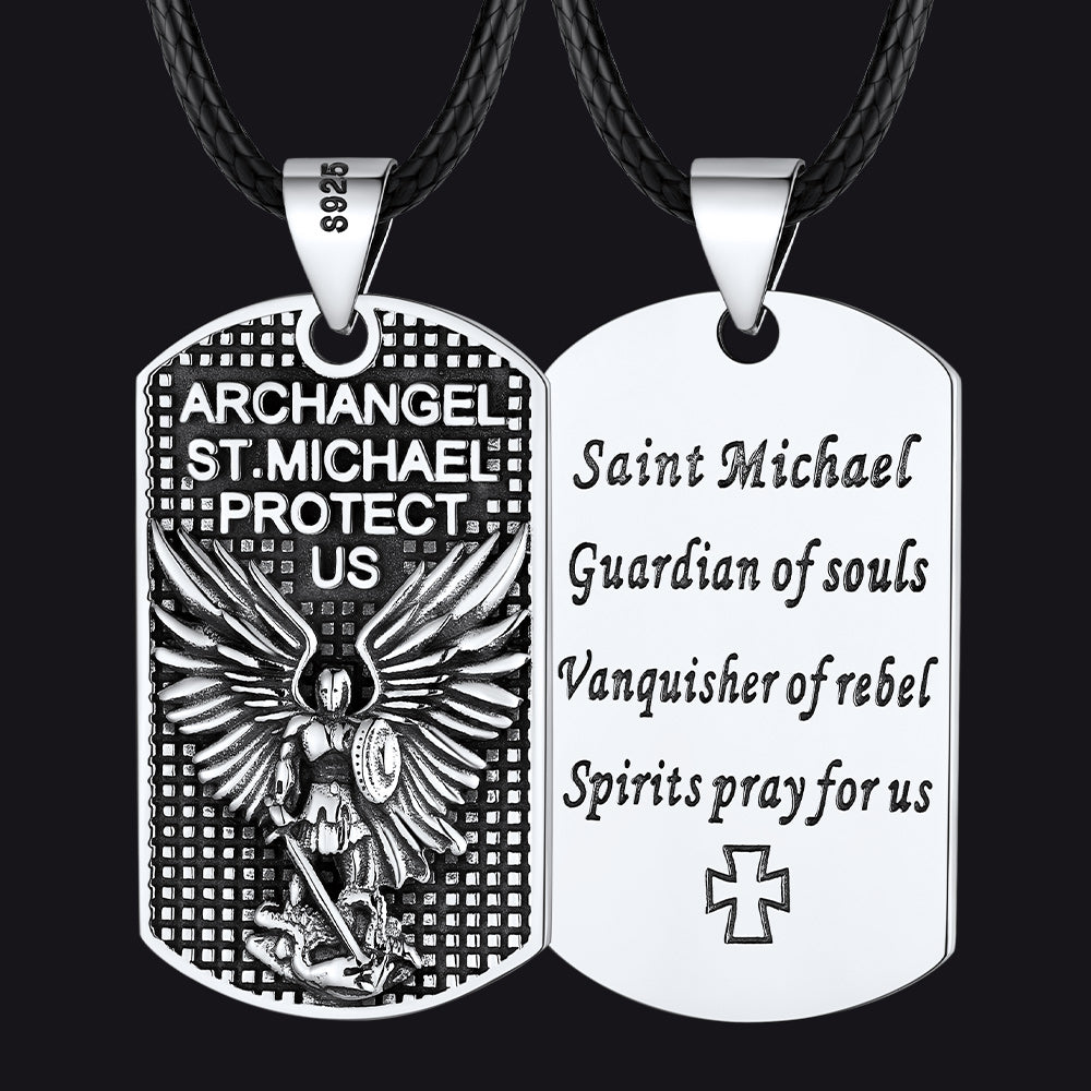 dog tag pendants with angelic design and text on a black background