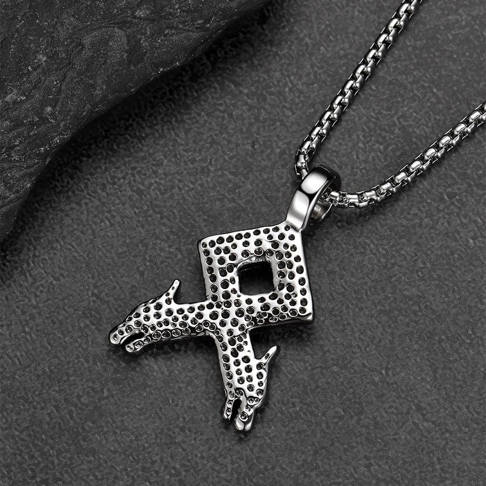 Norse Othala rune wolf pendant close-up jewelry photo