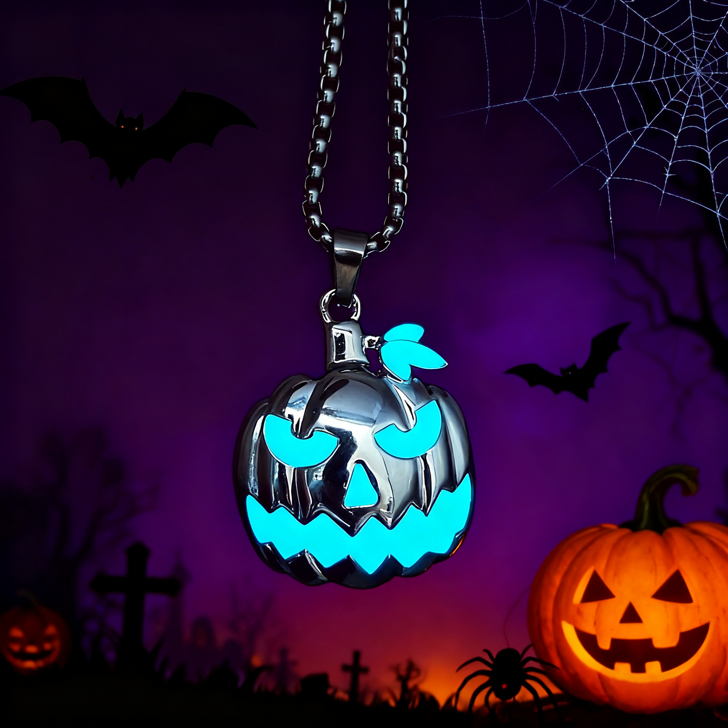 Pendant necklace with pumpkin skull design lit up at night