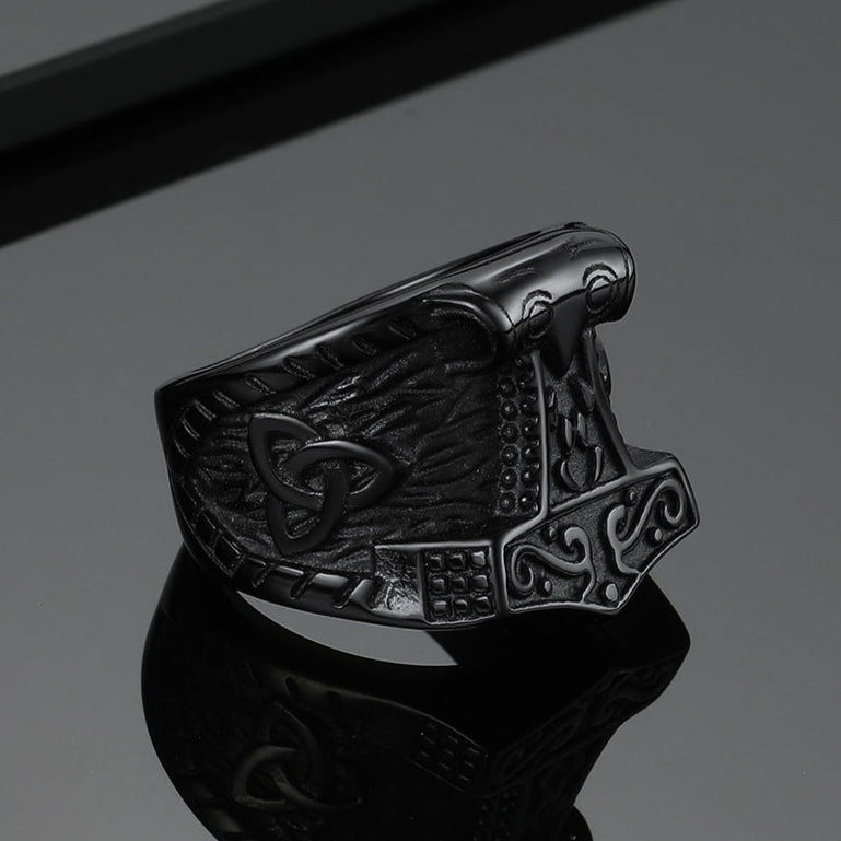 Black Viking Mjolnir signet ring for men, featuring Thor's Hammer and Celtic knot.