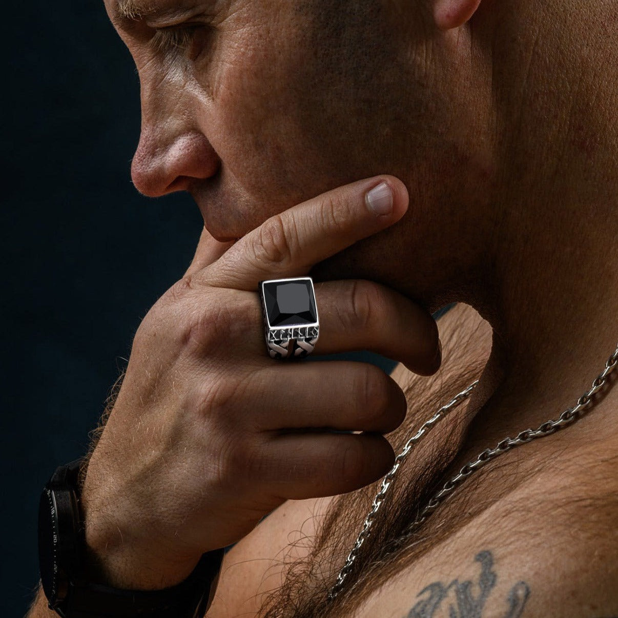 Man wearing black onyx gemstone signet ring