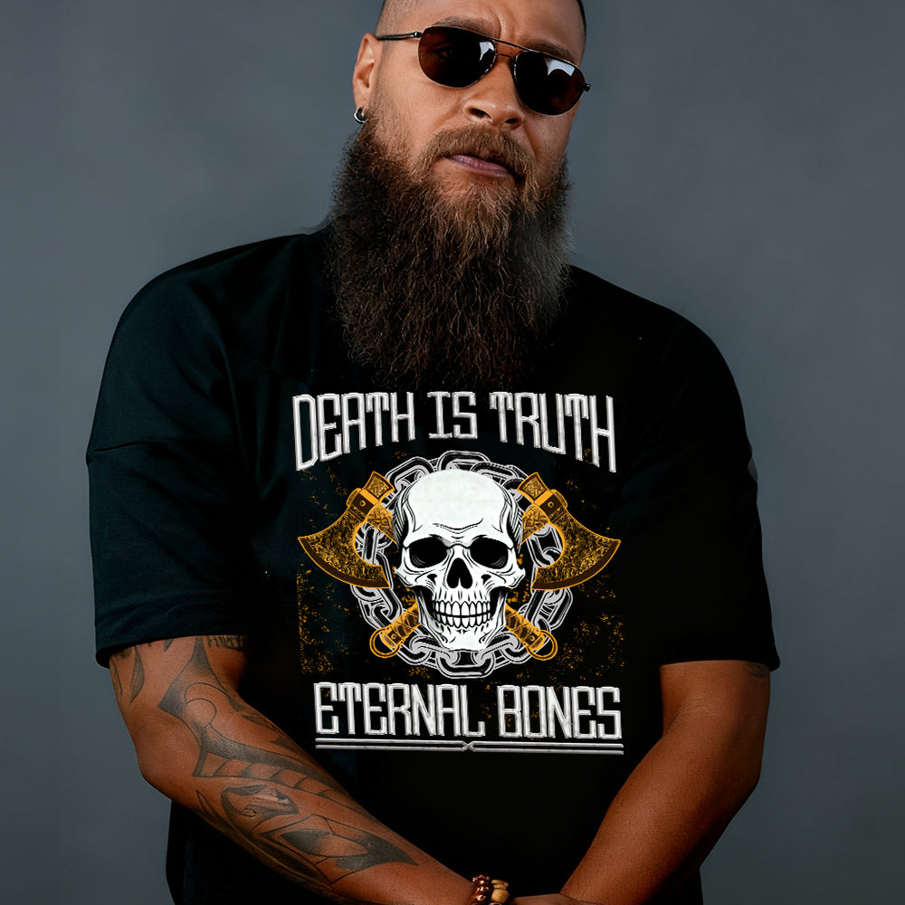 Person wearing a black t-shirt with a skull design and text on a dark background