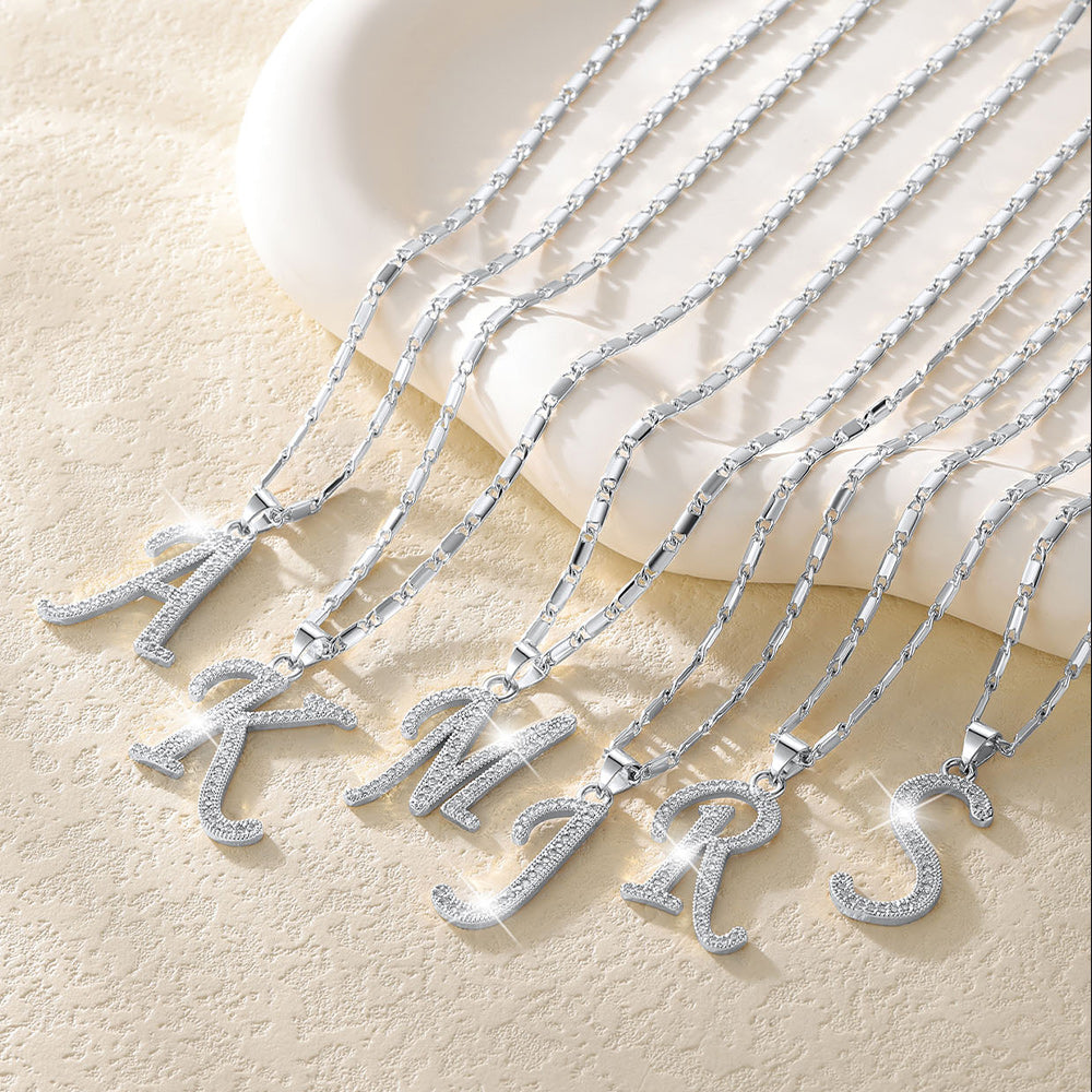 Platinum plated A¨CZ pendant necklace shiny 20 inch chain.