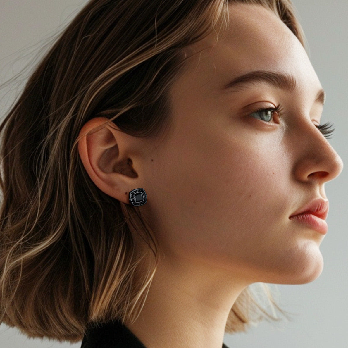 Woman wearing Sterling Silver Cubic Zirconia stud earrings