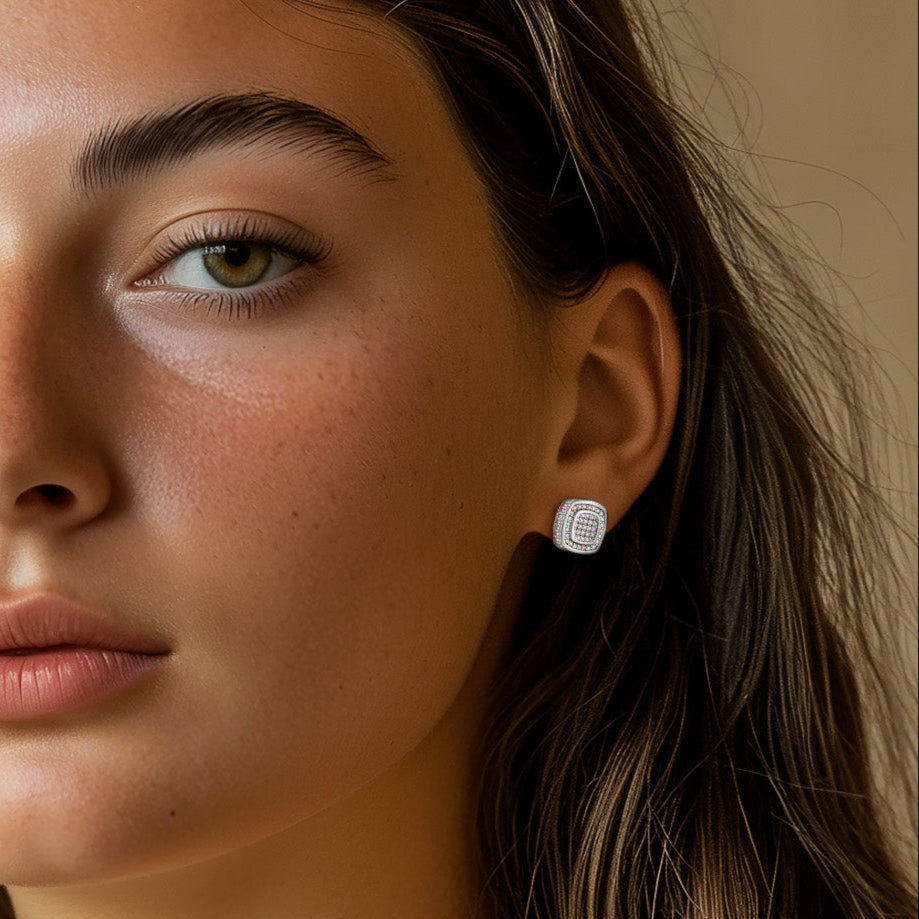 Woman wearing Cushion Cut Cubic Zirconia stud earrings, sterling silver