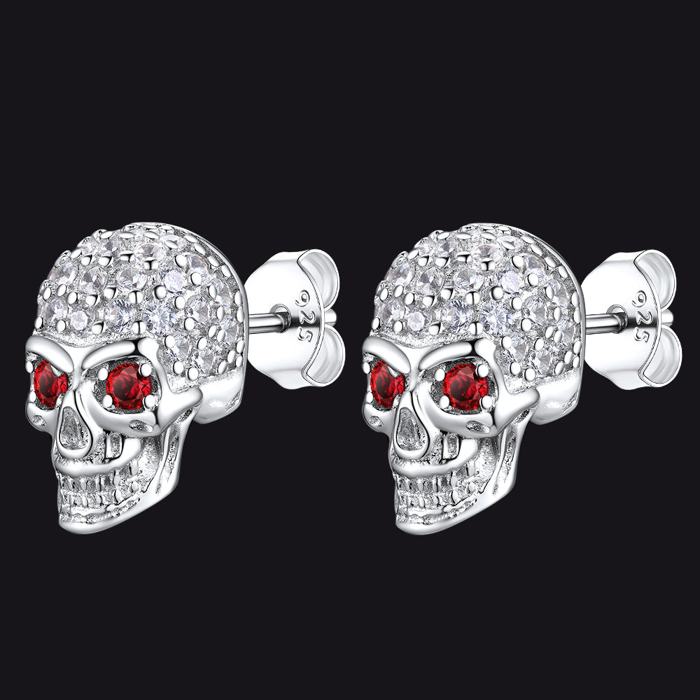 Sterling silver skull stud earrings with red eyes for men