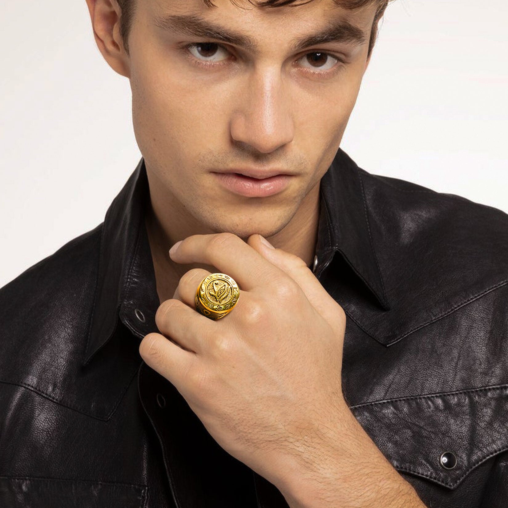 Man wearing Egyptian Horus Eye of Ra gold ring