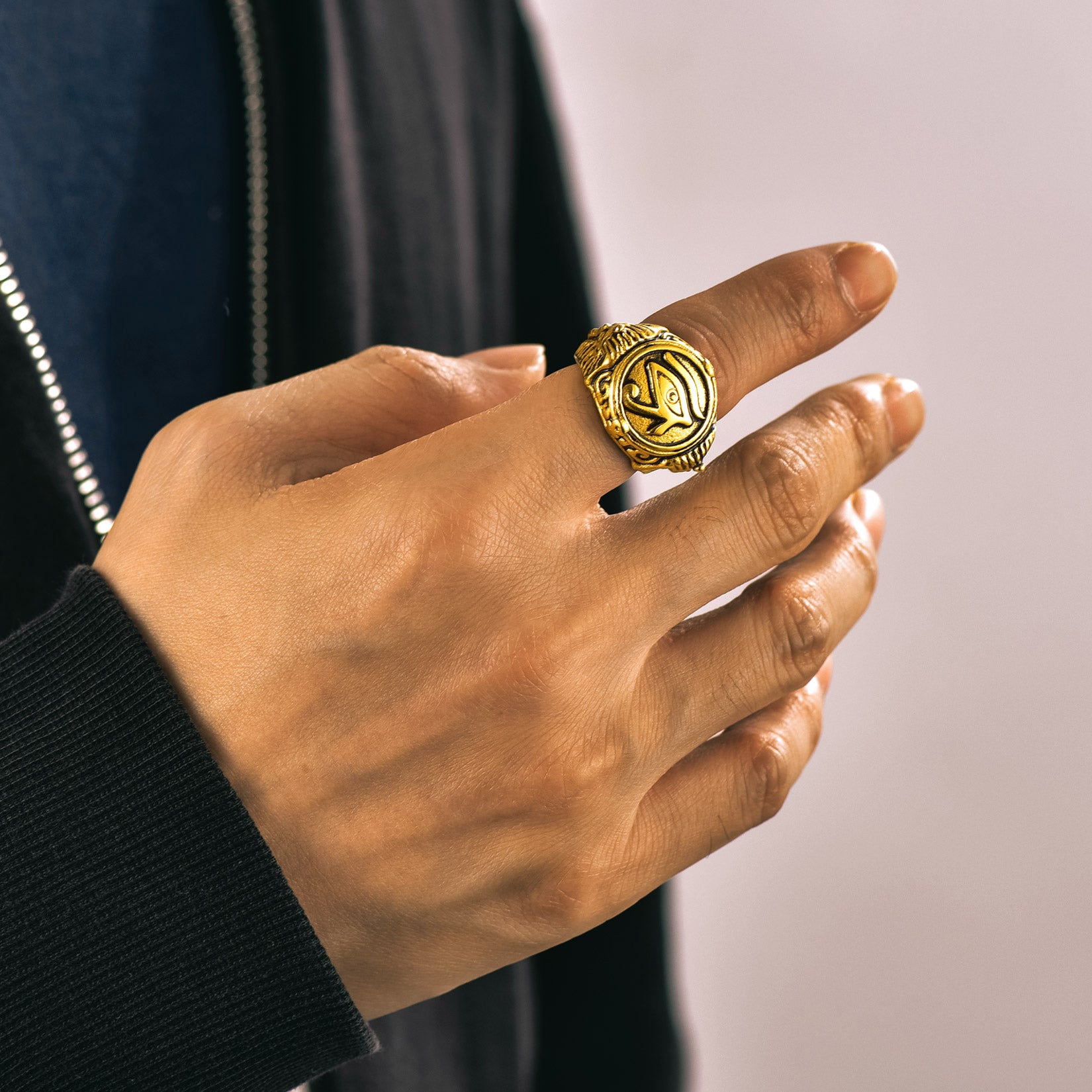 Man wearing Egyptian Eye of Ra ring