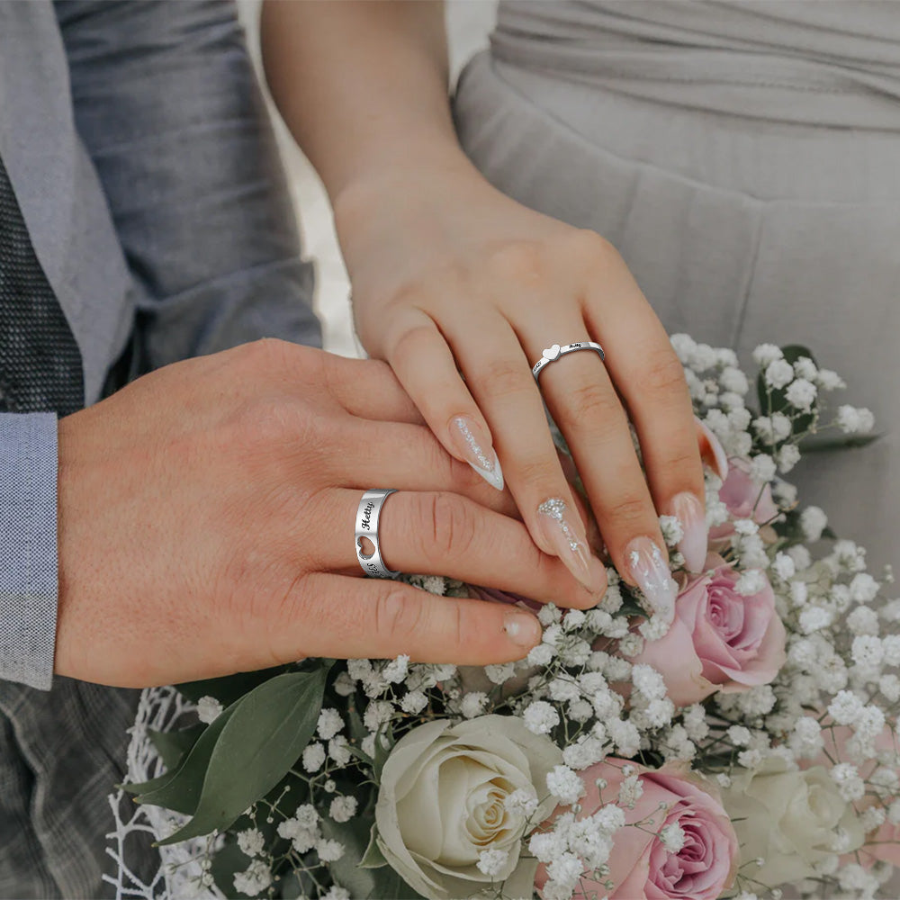 Couple wearing matching promise rings – personalized his and hers rings