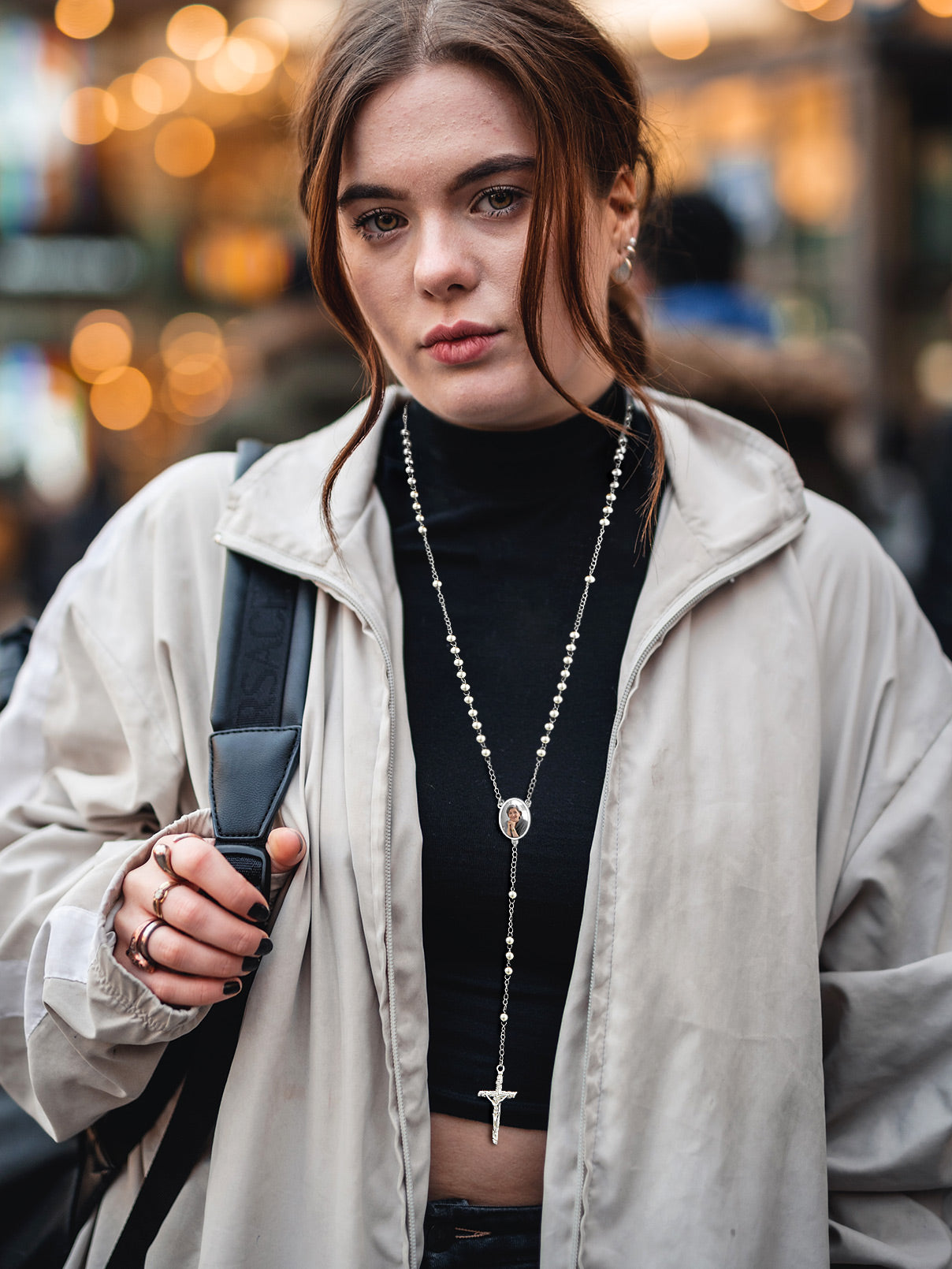 Woman wearing Rosary Beads Cross Necklace