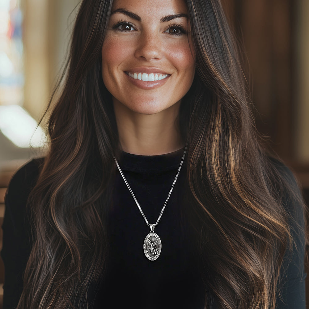 Woman wearing Saint Michael Oval Medal Necklace