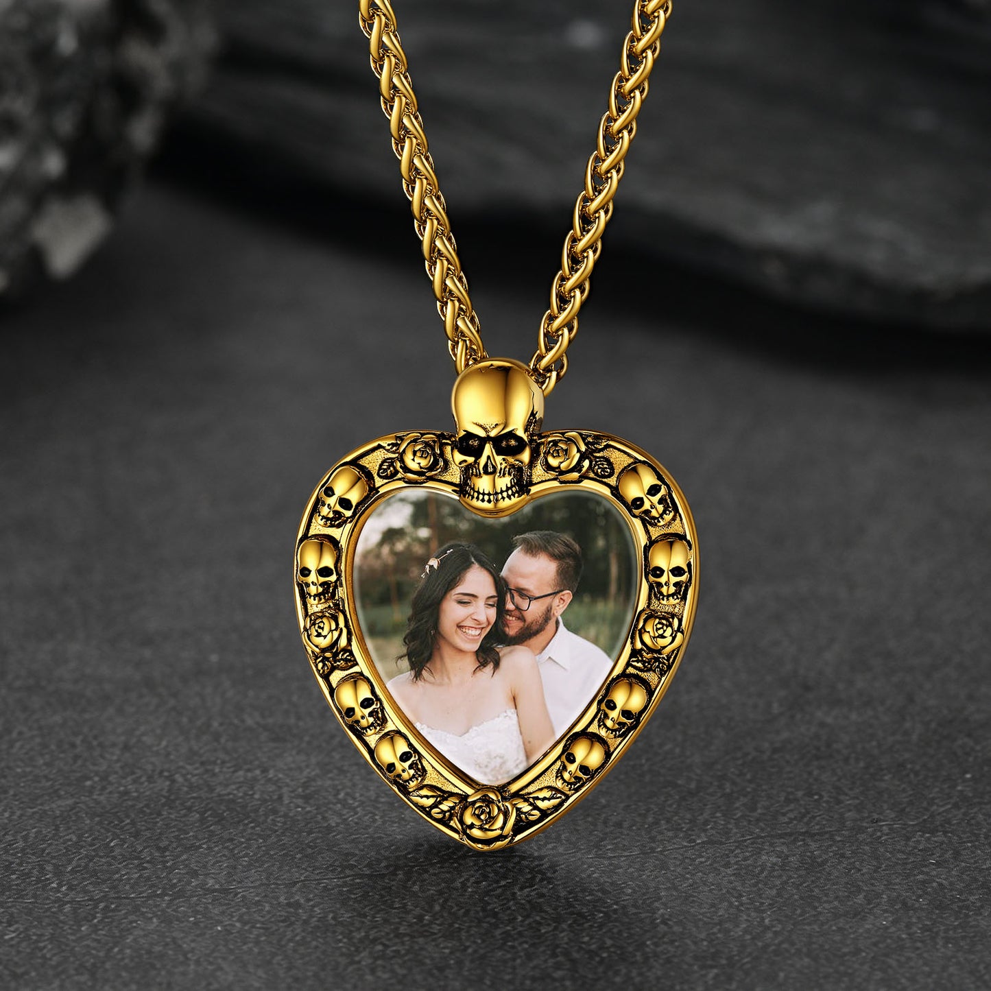 Gold heart-shaped photo pendant with skull details, memorial jewelry.
