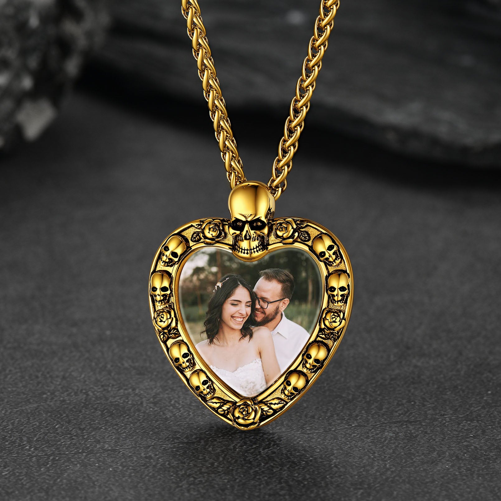 Gold heart-shaped photo pendant with skull details, memorial jewelry.