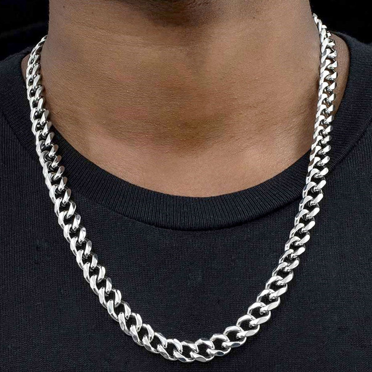 Stainless steel Cuban link chain necklace on a man's neck