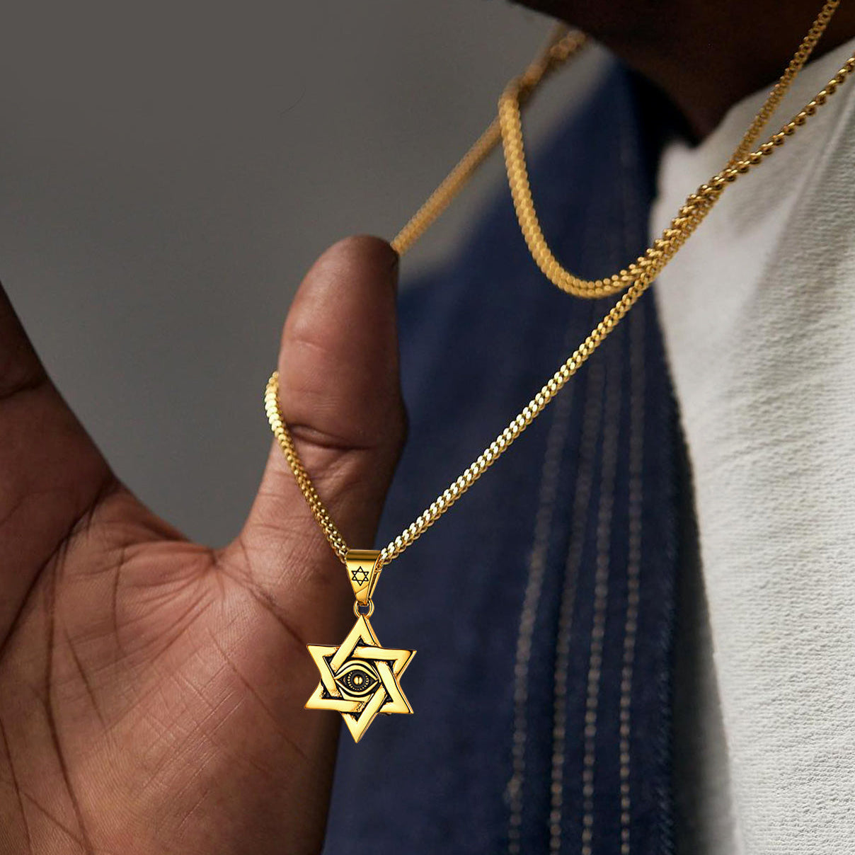 Gold Star of David necklace with eye of god pendant