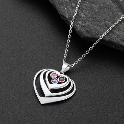 Heart-shaped pendant with embedded birthstone