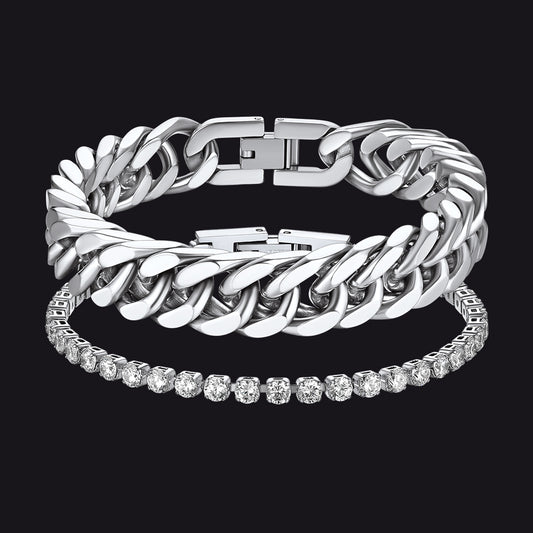 Silver chain bracelet with a diamond-studded band on a black backgroundimg