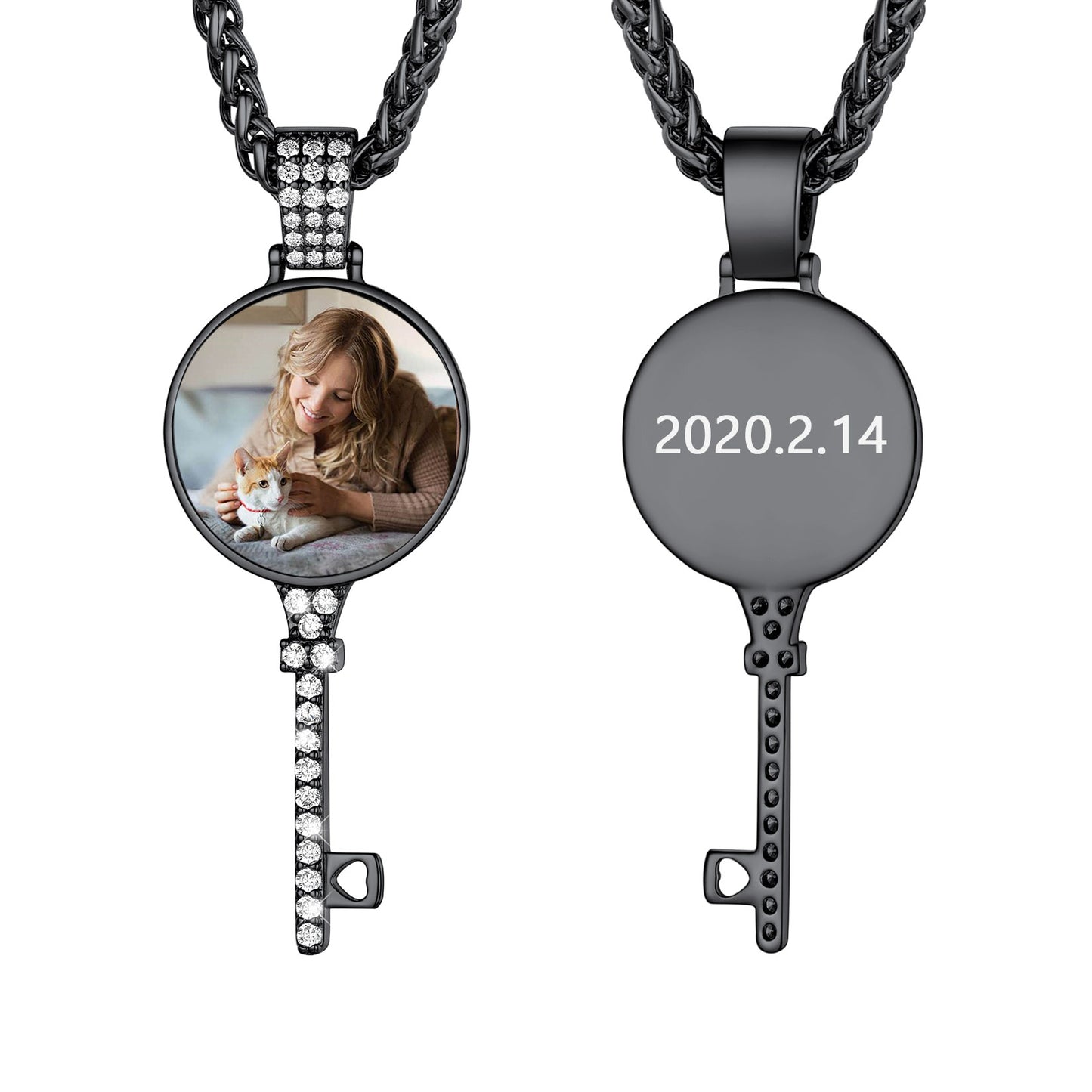 Two key-shaped pendants on braided chains, one with a photo of a woman and cat, the other with a date.