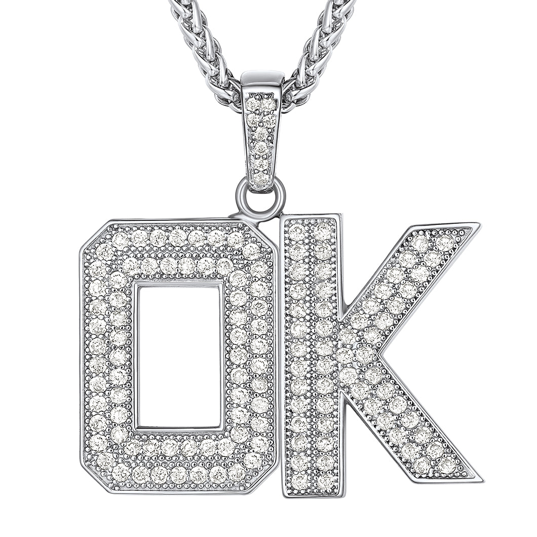 Silver necklace with 'OK' pendant on a white background