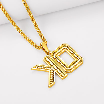 Gold necklace with a unique pendant on a white background