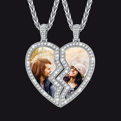 Heart-shaped pendant with two halves, each showing a photo of a couple, on a black background.