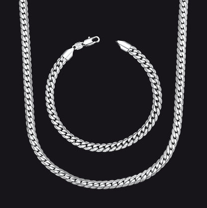 A silver Cuban link chain necklace and matching chain bracelet.