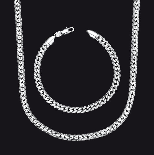 A silver Cuban link chain necklace and matching chain bracelet.img