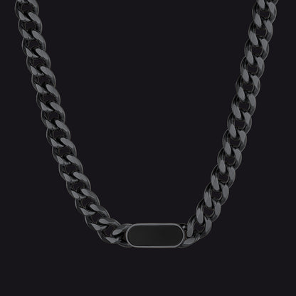 Black chain necklace with a rectangular tag on a black background
