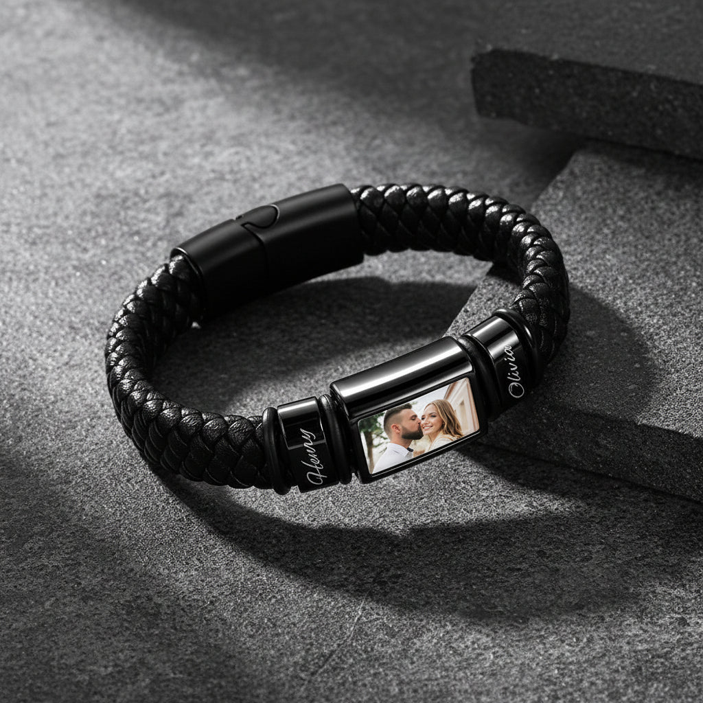 Personalized braided leather bracelet with custom name engraving, flat lay product display