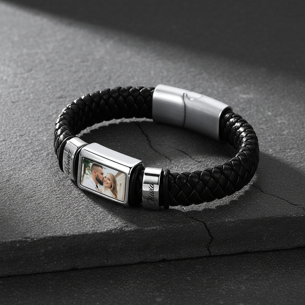 Personalized braided leather bracelet with custom name engraving, flat lay product display