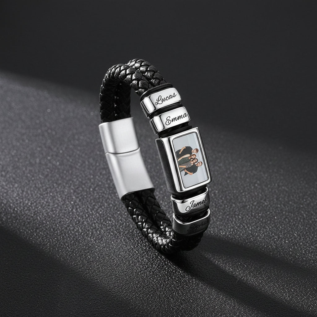A personalized black braided leather bracelet with silver-tone metal charms. 