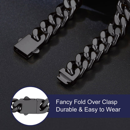 Black miami cuban chain and bracelet with a fancy fold over clasp on a dark background
