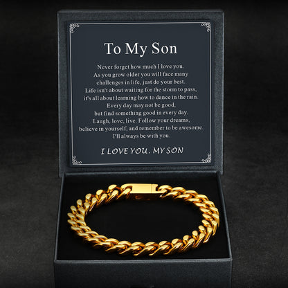 Gold chain bracelet in a black box with a message for a son 
