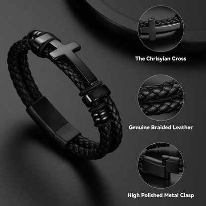 Silver-tone cross pendant design detail – stainless steel cross on black leather bracelet