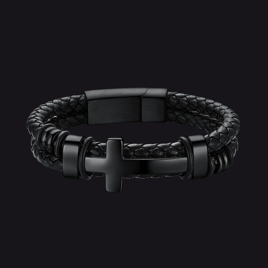 Black braided stainless steel cross leather bracelet for men, front view on black backgroundimg