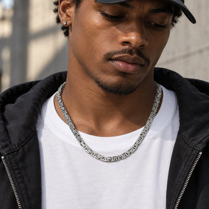 Man wearing stainless steel Byzantine link chain necklace