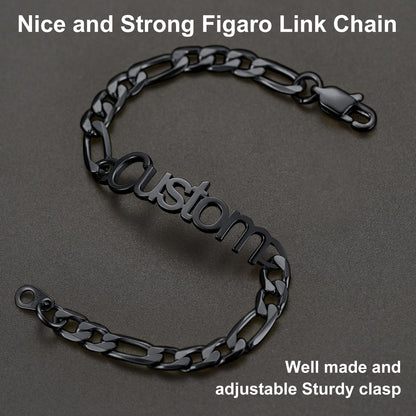 Black chain bracelet with 'custom' engraving on a dark background