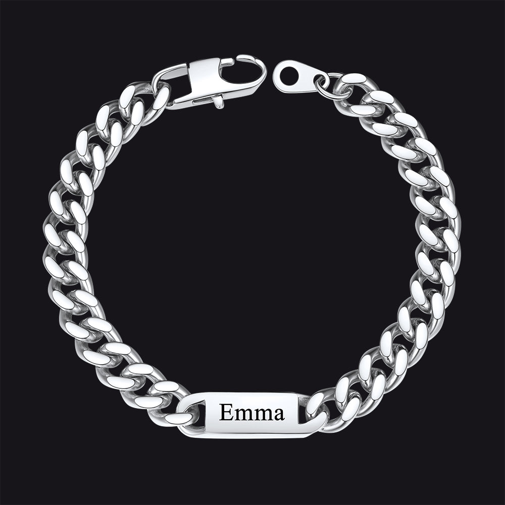 Silver chain bracelet with a nameplate on a black background
