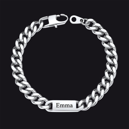 Silver chain bracelet with a nameplate on a black background